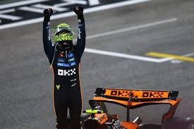 Lando Norris celebrates securing his first Formula 1 World Championship at the 2025 Abu Dhabi Grand Prix