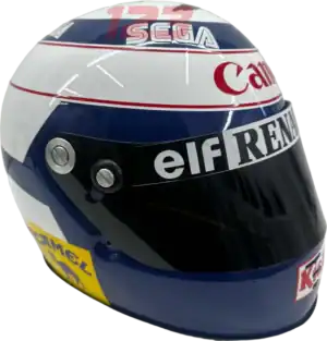 Full-scale replica of Alain Prost’s 1993 Formula 1 helmet with “SONIC” branding, detailed collector’s display model.