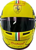 Full-scale replica of Charles Leclerc’s 2022 Monza Grand Prix helmet, detailed collector’s display model.