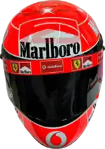 Full-scale replica of Michael Schumacher’s 2006 Formula 1 helmet, detailed collector’s display model.
