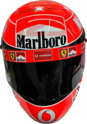 Full-scale replica of Michael Schumacher's 2002 Ferrari Formula 1 helmet, detailed collector's display model.