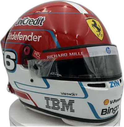 Charles Leclerc 2026 Ferrari replica helmet — display angle showing the gold prancing horse accent and carbon visor frame