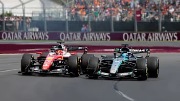 George Russell and Charles Leclerc battle during the 2026 Australian Grand Prix in Melbourne