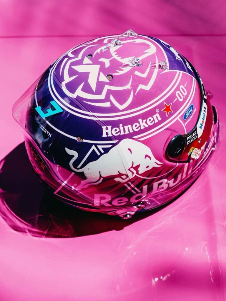 Photo by JMD Jens Munser Designs on April 29, 2026. May be an image of racing vehicles, helmet, glasses and text.