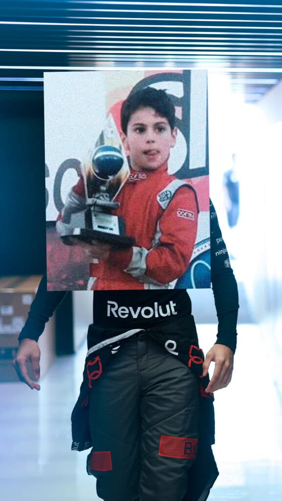 Photo shared by Gabriel Bortoleto on April 30, 2026 tagging @audif1. May be an image of racing vehicles, glasses, helmet and text that says 'GOda Revolut visit QATAR C bọ MUW Revo Ca NEXO இ‍ර PIDUADRO