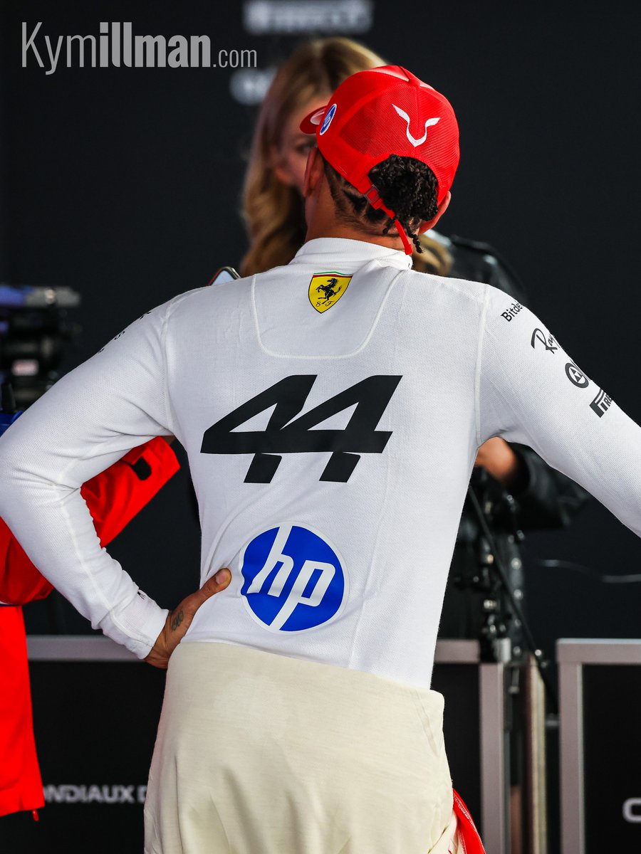 HAPPY WITH FIFTH

Lewis Hamilton left the garage smiling after qualifying fifth, despite a mistake o