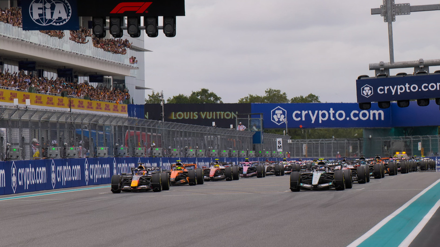 Charles Leclerc seizes the lead at Lap 1 Turn 1 as Max Verstappen spins after contact at the 2026 Miami Grand Prix