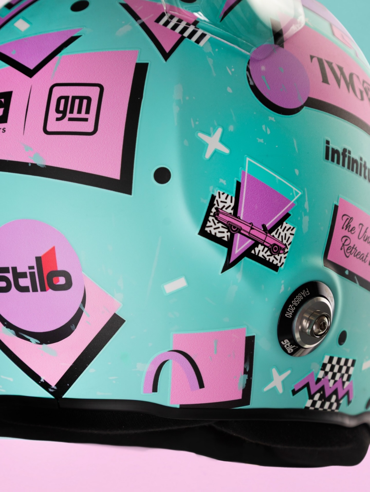 Photo shared by Stilo Official on May 01, 2026 tagging @valtteribottas, @stilo_usa, and @cadillacf1. May be an image of racing vehicles, helmet, portable cassette player and text.