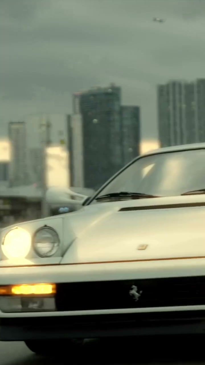 Hamilton mid-flow in Miami — neon palette meets Prancing Horse red in motion