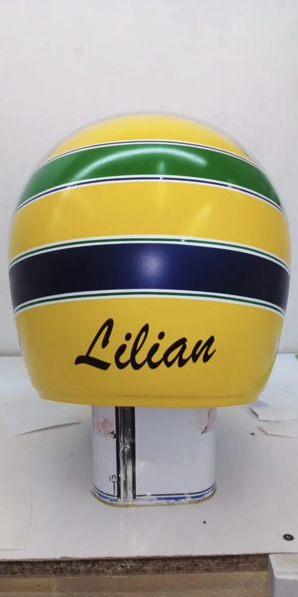 Personalized hand-painted name on a custom F1 replica display helmet