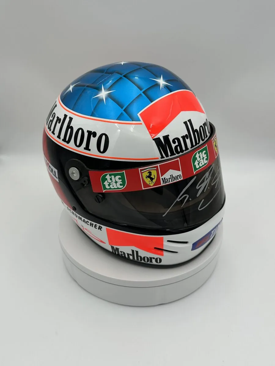 Full-size display replica helmet built around an original signed Michael Schumacher visor