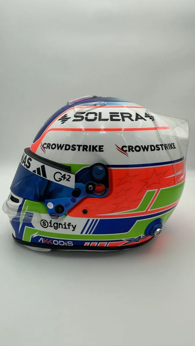Custom F1 replica display helmet — atelier commission