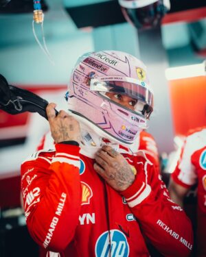 Lewis Hamilton's pink crystal Ferrari helmet for the 2026 Monaco Grand Prix — display/collector reference image (front)