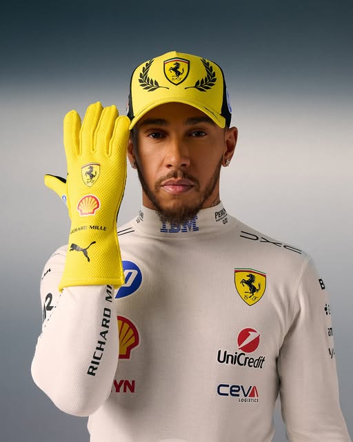 Lewis Hamilton wearing the special bright-yellow Ferrari gloves and laurel-crest cap for the 2026 British Grand Prix at Silverstone