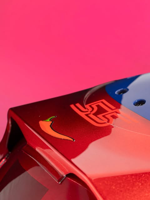 Carlos Sainz 2026 British GP helmet — 55 and chilli detail