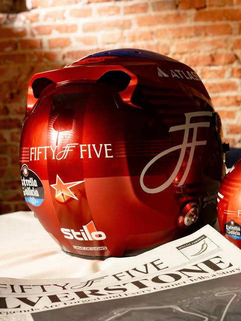 Carlos Sainz 2026 British GP helmet — rear view of the candy-red shell with FIFTY FF FIVE lettering