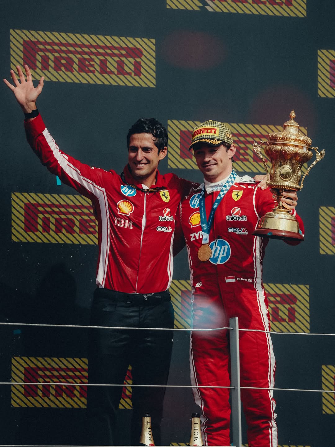 Charles Leclerc's Ferrari Monaco GP 2021 collector replica helmet with red and white livery in close detail.