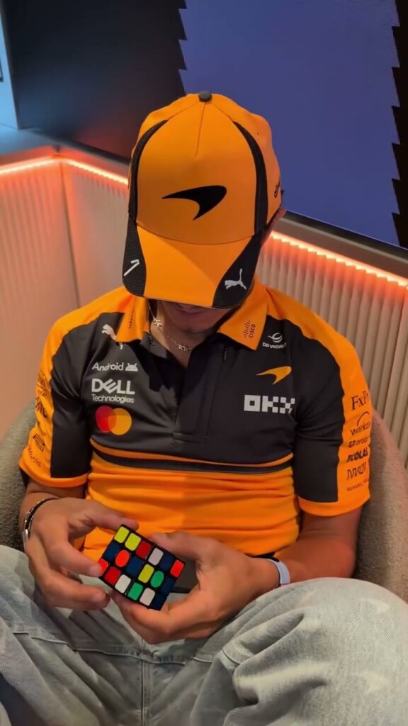 Video by McLaren Mastercard Formula 1 Team 🧡 on July 24, 2026. May be a video game screenshot of helmet and text.