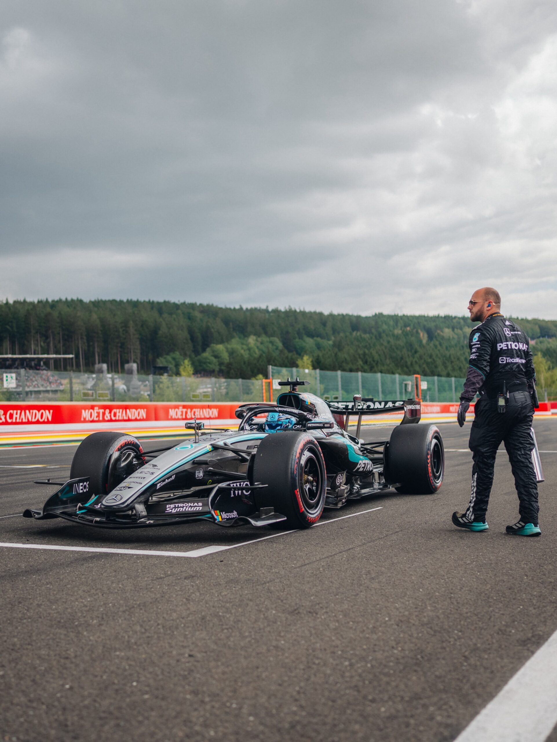 George Russell out of the Belgian GP on the opening lap after contact with Lewis Hamilton at Les Combes