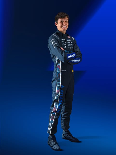 Full-length Williams 2026 British GP race suit showing the red-white-blue brushstroke down the leg