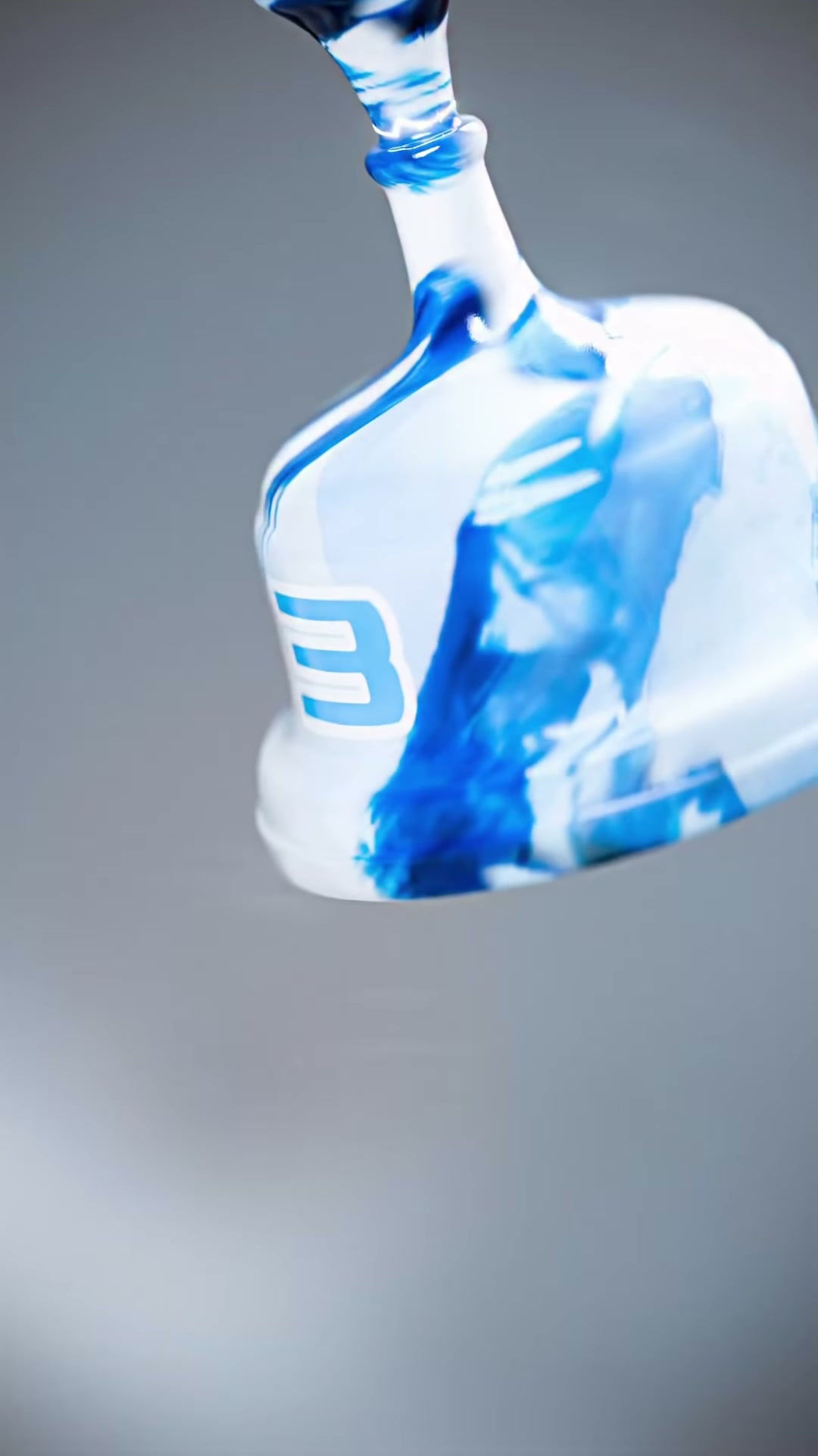 White ceramic trophy with blue brushwork marked with the number 3