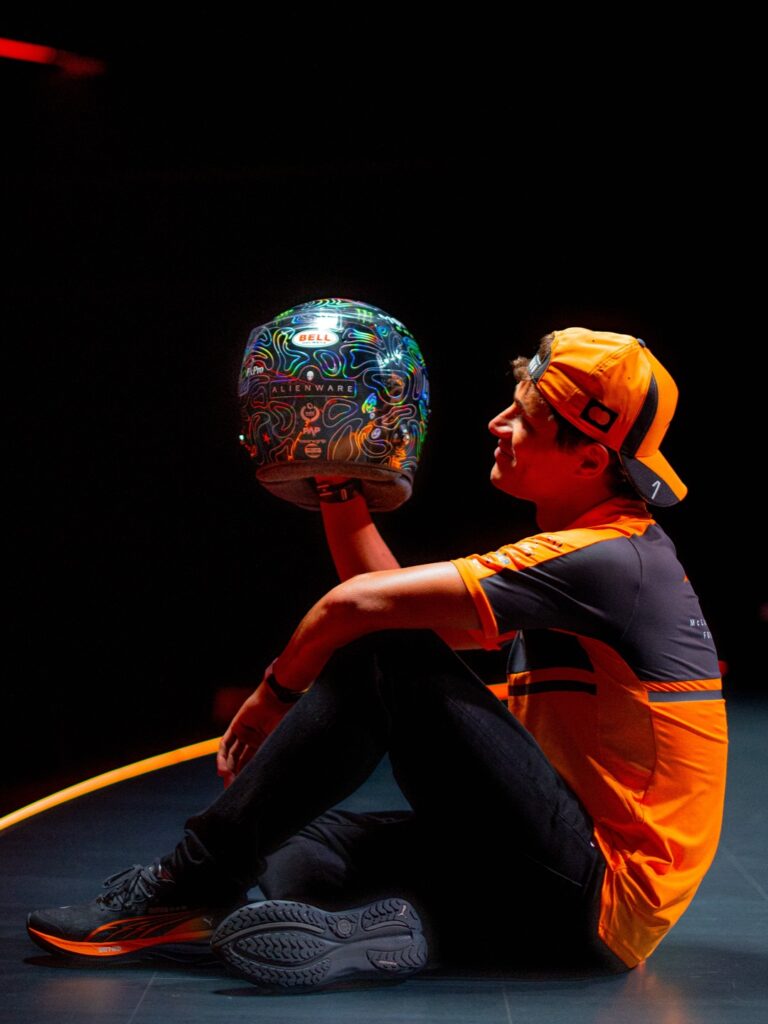 Photo by McLaren Mastercard Formula 1 Team 🧡 on August 19, 2026. May be an image of text that says 'BELL HELMETO BELL FxPro ALIENWARE EN IENWAR N w PAP'.