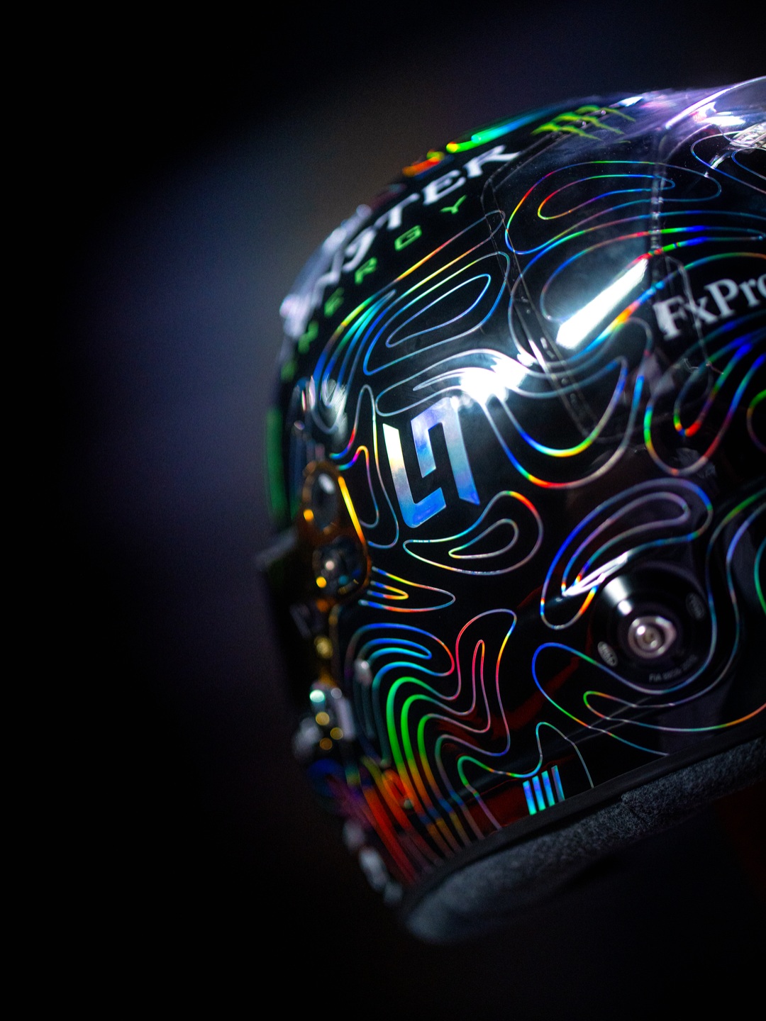Holographic LN4 monogram on the side of Lando Norris's black Zandvoort helmet
