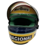 Ayrton Senna 1992 McLaren F1 replica helmet — front view with visor raised, collector display model