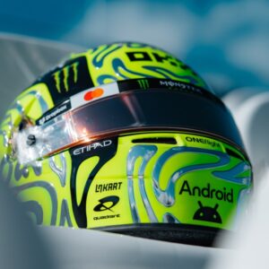 Lando Norris's 2026 British GP helmet design, fluoro-green swirls, side view