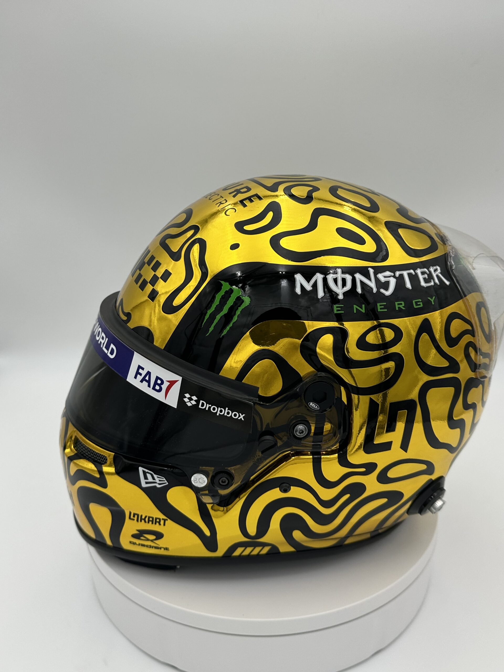 Lando Norris 2025 Gold World Champion full-size 1:1 F1 replica helmet, display and collector piece, studio photo on white background