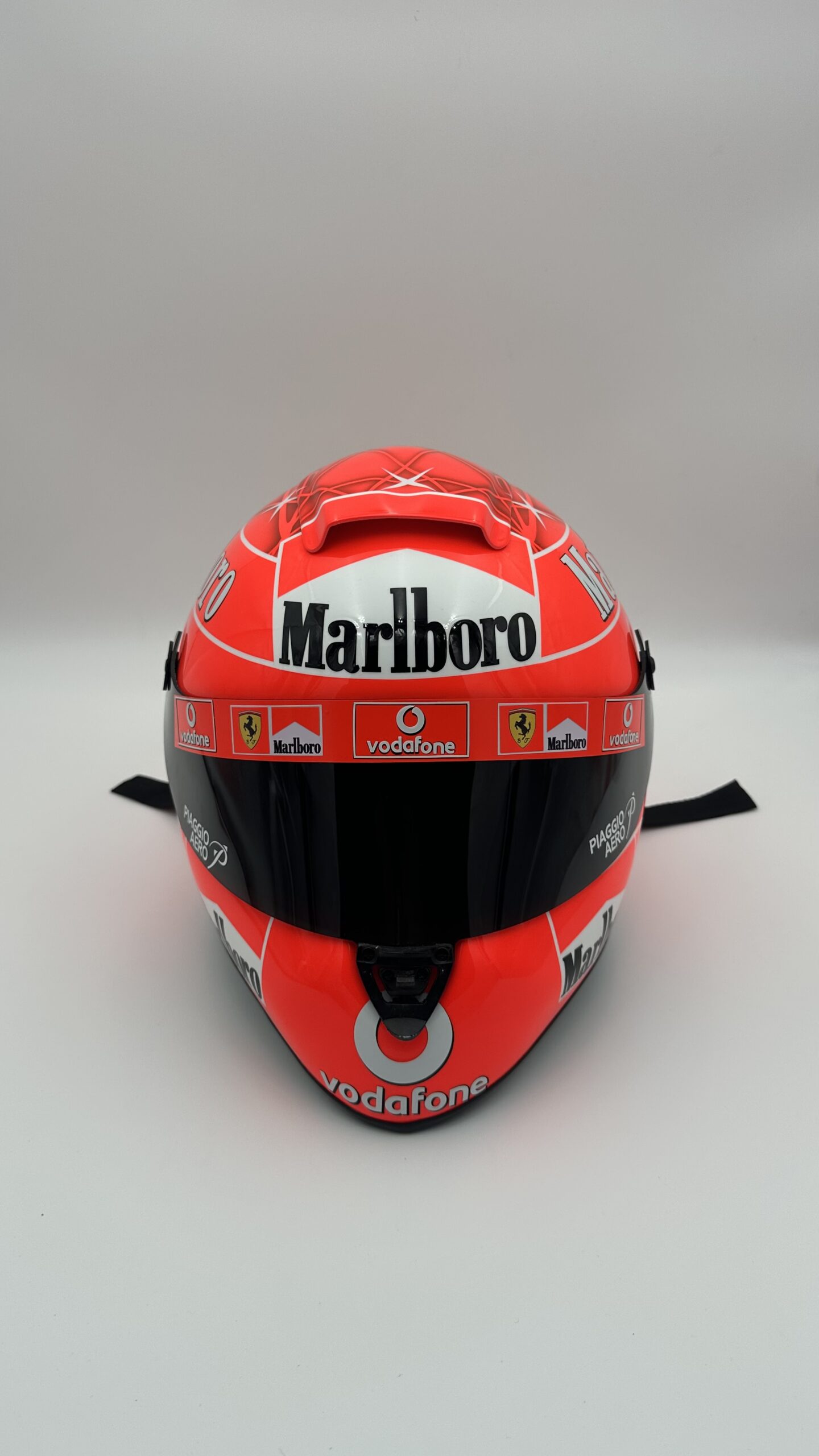 Michael Schumacher 2005 full-size 1:1 F1 replica helmet, display and collector piece, studio photo on white background