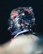 Lewis Hamilton's Austin 2026 helmet from behind, worn: space scene with white stars, the number 44, Peroni Nastro Azzurro 0.0% and Bingx at the back