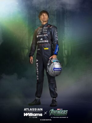 Alex Albon in his one-off Marvel race suit for the 2026 US GP, holding his silver helmet