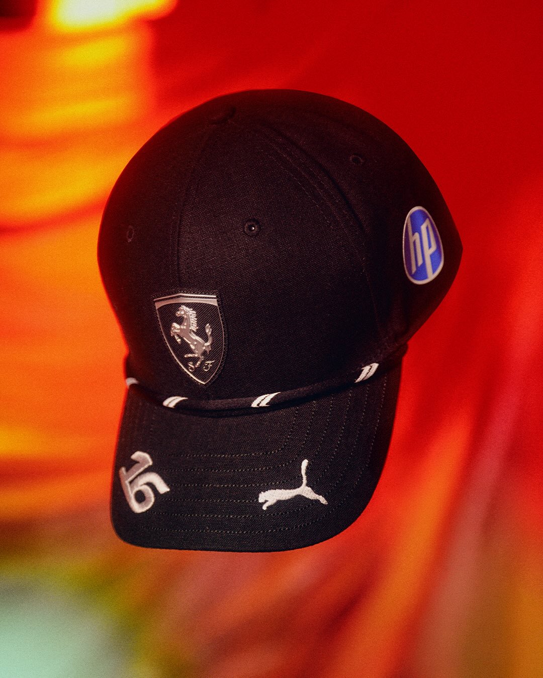 Charles Leclerc's Singapore GP 2026 special race suit and cap (Ferrari x Puma) — photo 2