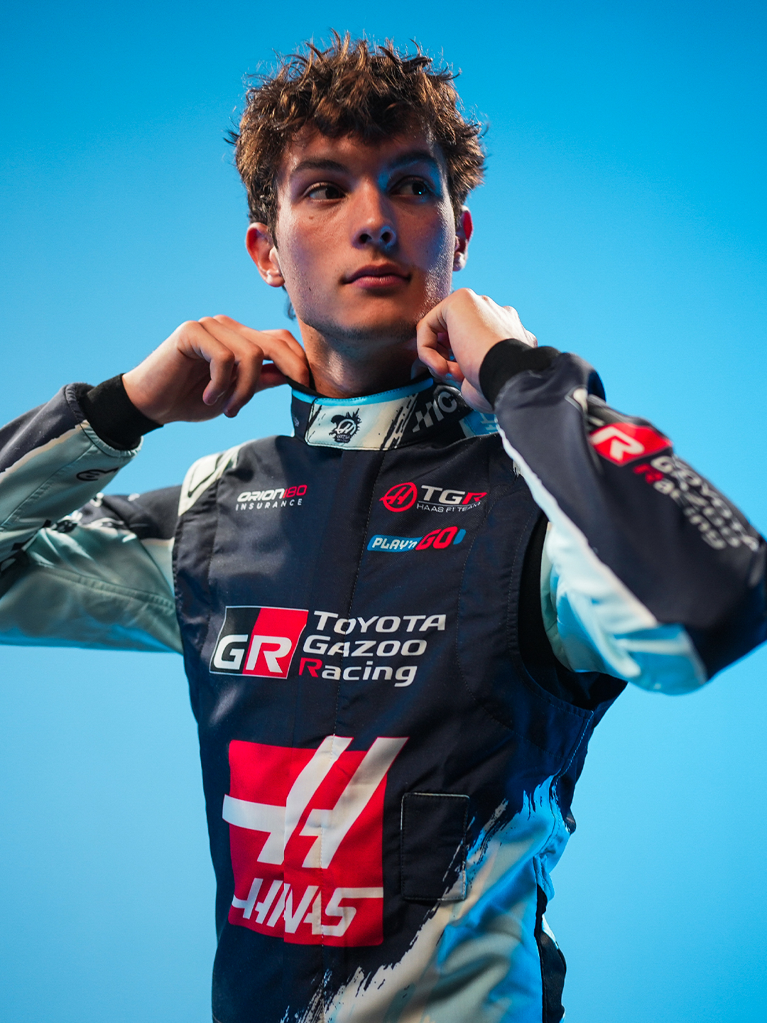 Haas reveals Godzilla Minus Zero race suits for Bearman and Ocon in Austin — photo 2