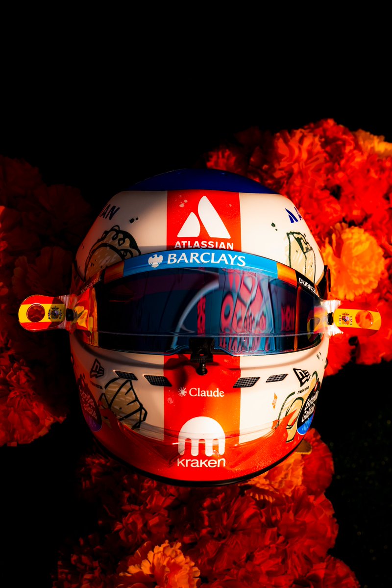 Front of Carlos Sainz's 2026 Mexico City GP helmet, with ATLASSIAN above the visor and the BARCLAYS visor strip