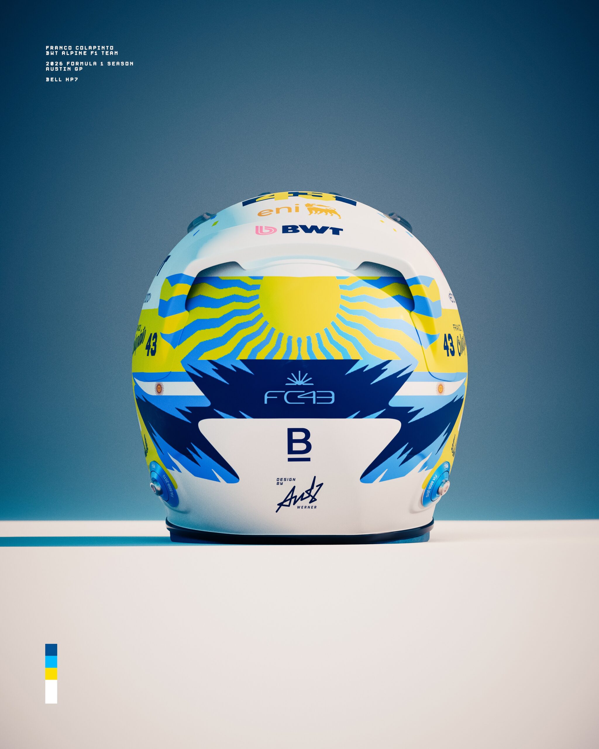 Back of Colapinto's Austin 2026 helmet: a large yellow sun with wavy rays over a navy band with the FC43 logo and the designer's signature