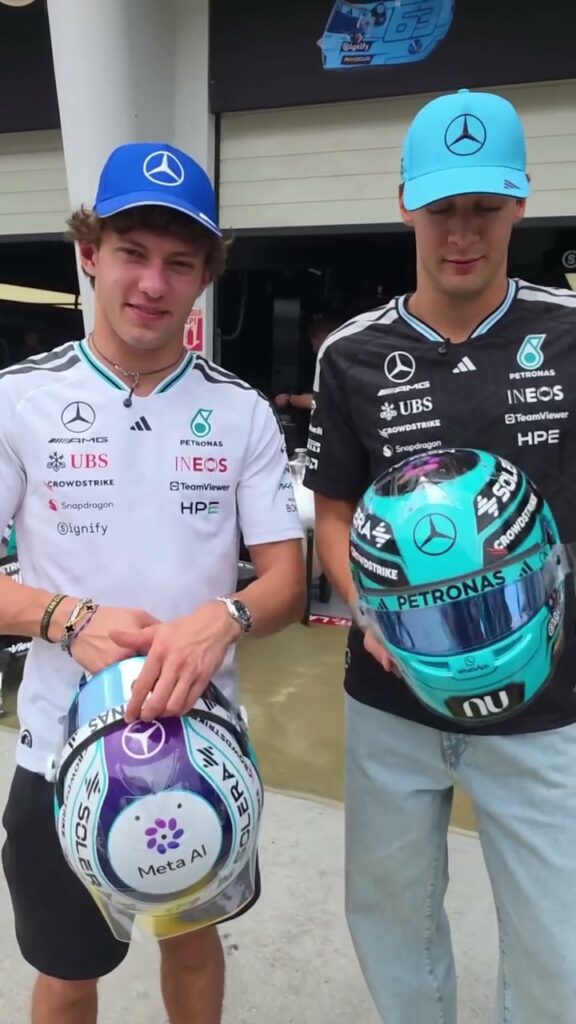 George Russell and Kimi Antonelli with their PETRONAS Malaysia helmets